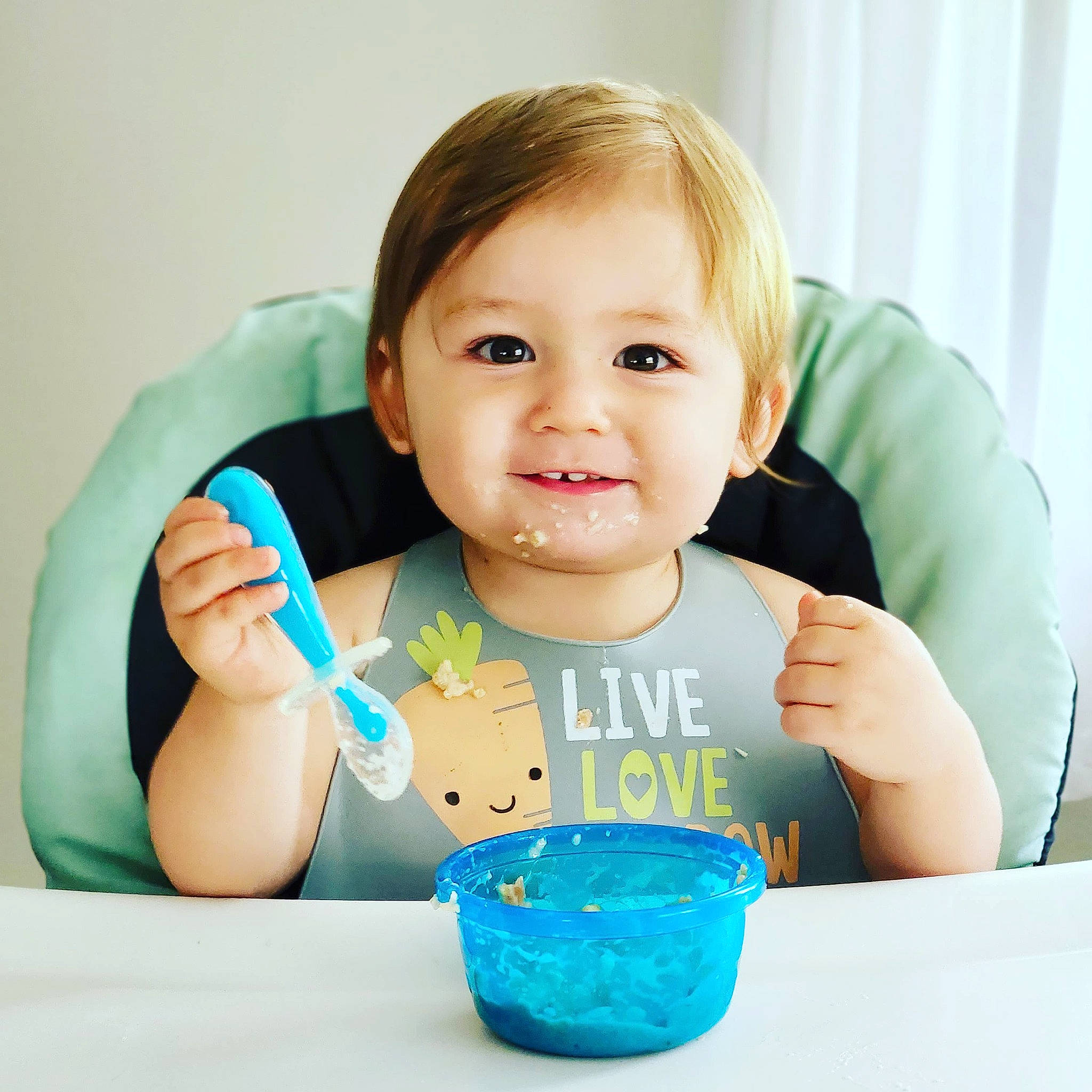 Rowan joined the competition — help win amazing prizes! arm, baby, baby_grabbing_for_something, baby_toddler_clothing, cheek, child, desk, drinkware, finger, food_craving, fun, hand, happy, joy, person, skin, sleeve, smile, sweetness, t_shirt