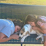 Steely Dan joined the competition — help win amazing prizes! children, dog, puppy, sleeping, cuddling, outdoor, lounge_chair, blanket, pink_dress, blue_shirt, pet, family, companionship, relaxed, sunlight, grass, portrait, animal, comfort, cute