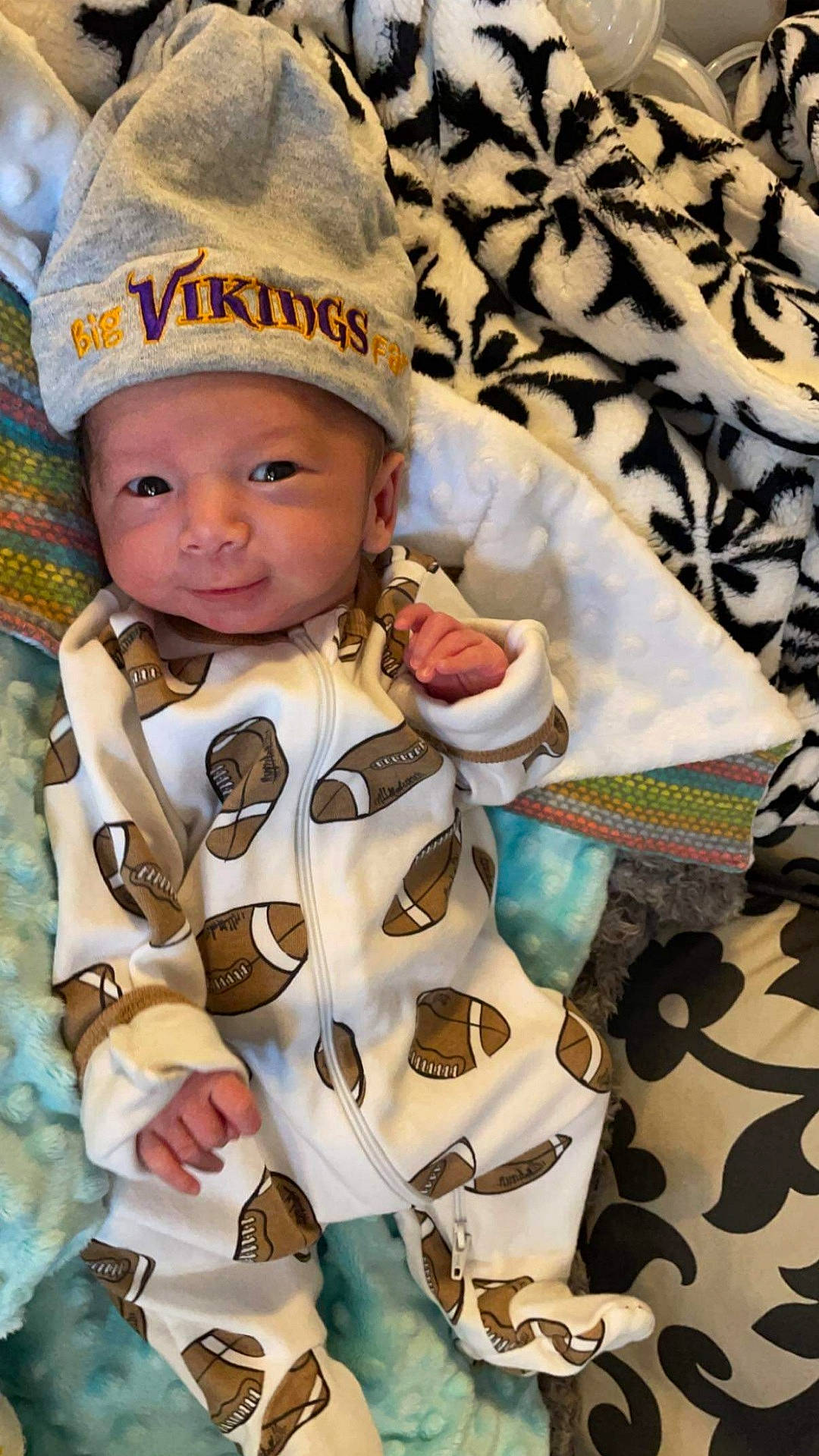 Hayes joined the competition — help win amazing prizes! baby, baby_products, baby_toddler_clothing, beanie, cap, child, fashion_accessory, fun, happy, headwear, jacket, jewellery, knit_cap, outerwear, pattern, person, portrait_photography, sitting, sleeve, smile
