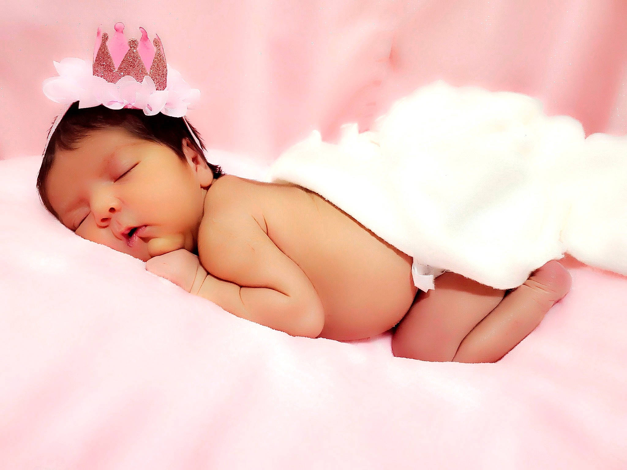 Angela is registered to the contest to win money with this photo: baby, baby_sleeping, baby_toddler_clothing, child, flesh, hair_accessory, hand, headband, headgear, headpiece, person, photography, pink, product, skin, stomach, sweetness, toddler