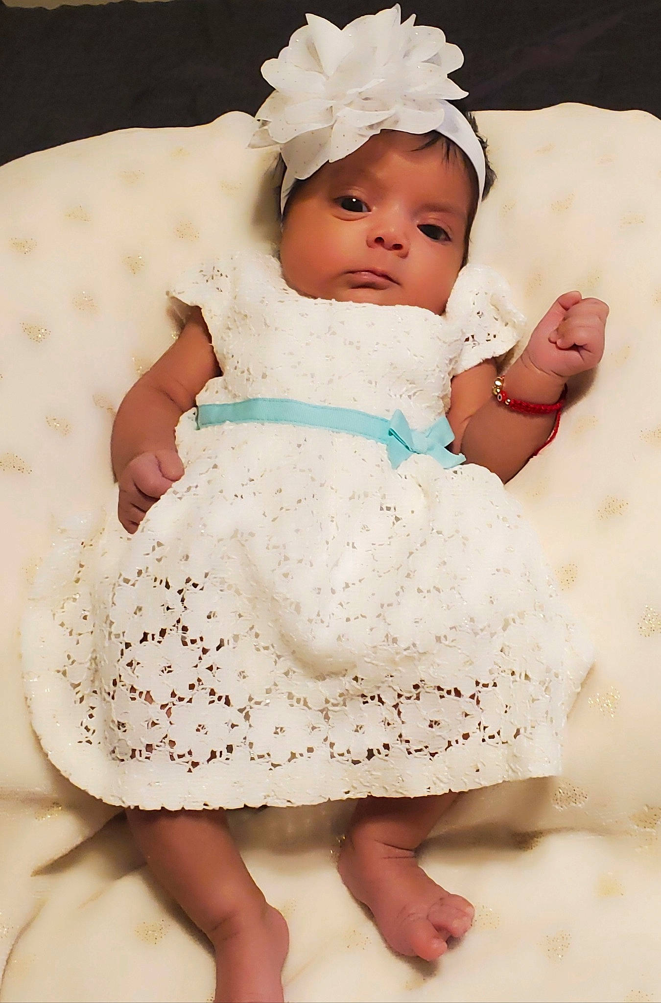 Angela joined the competition — help win amazing prizes! baby, baby_products, baby_sleeping, baby_toddler_clothing, bonnet, child, dress, hair_accessory, headgear, headwear, person, photograph, photography, product, sitting, skin, textile, toddler, white