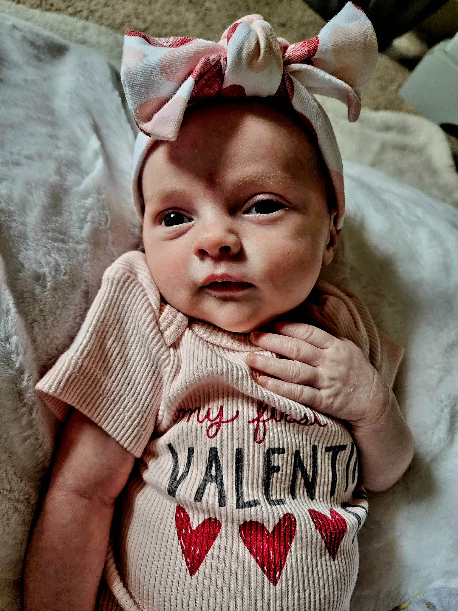 Gabriella is registered to the contest to win money with this photo: baby, baby_toddler_clothing, cheek, child, eye, eyelash, fashion_accessory, fur, happy, linens, lip, organ, pattern, person, pink, skin, sleeve, t_shirt, textile, toddler