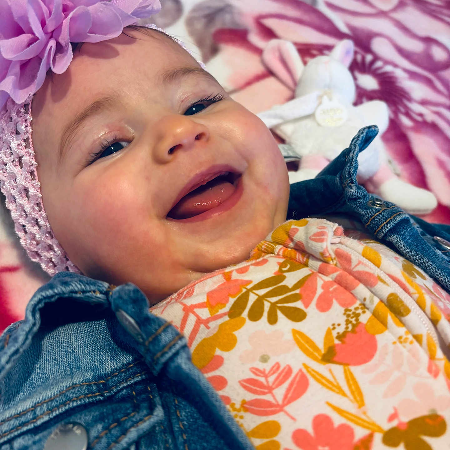 Nour participe au concours pour gagner de l'argent avec cette photo : accessories, baby, babylaughing, bonnet, cap, clothing, coat, face, happy, hat, head, jacket, jeans, laughing, pants, person, photography, portrait, purple, smile