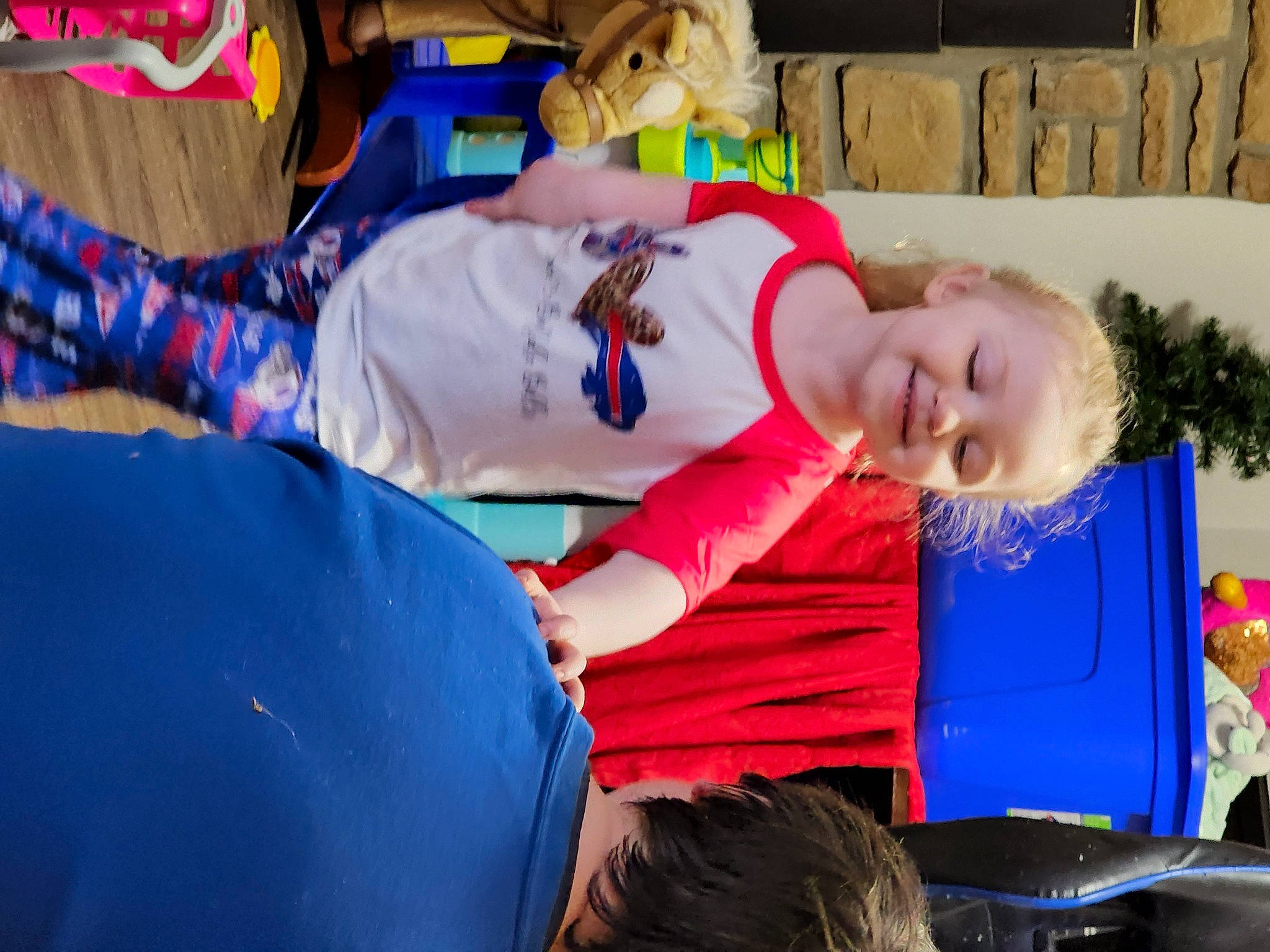 Nordica is registered to the contest to win money with this photo: child, electric_blue, event, fun, happy, hat, joy, kindergarten, leisure, person, play, room, sitting, smile, t_shirt, toddler, tree