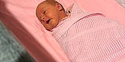 Alyissa is registered to the contest to win money with this photo: baby, bed, blanket, child, cozy, cute, fabric, head, indoors, infant, newborn, peaceful, pink, portrait, resting, sleeping, soft, swaddle, warm, wrapped