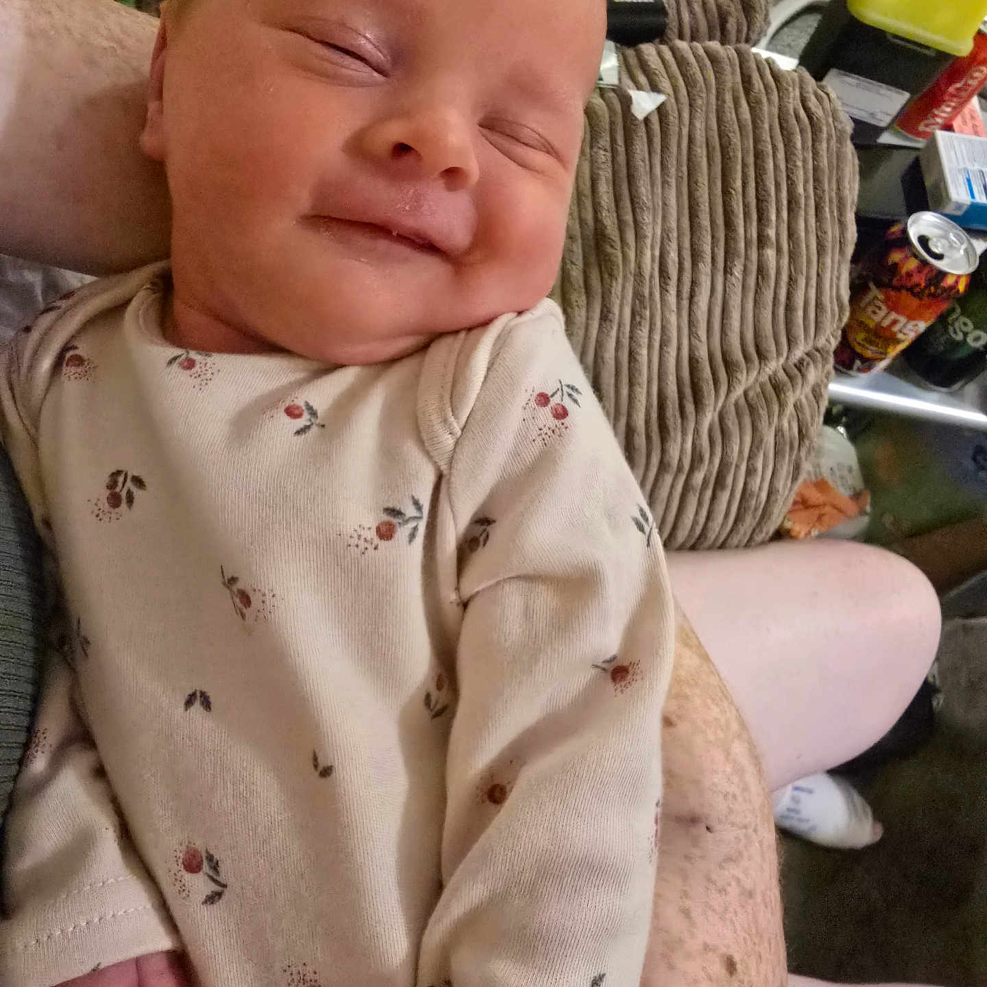 Alyissa joined the competition — help win amazing prizes! arm, baby, blanket, can, clothing, couch, fabric, floor, furniture, hand, home, indoor, infant, pattern, person, remote_control, skin, sleeping, smiling, socks