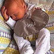 Alyissa joined the competition — help win amazing prizes! baby, baby_seat, bib, child, cute, footwear, hand, indoors, infant, joie, newborn, pajamas, patterned_fabric, peaceful, polka_dots, portrait, resting, sleeping, small_hands, soft_lighting