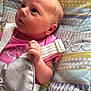 Alyissa joined the competition — help win amazing prizes! baby, baby_seat, child, closeup, comfort, cute, expression, face, hand, indoors, infant, knitted_blanket, looking_up, newborn, patterned_fabric, person, pink_clothing, portrait, seated, soft_lighting
