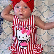 Kelsy a rejoint le concours — aidez-le/la à gagner de superbes lots ! baby, child, headband, bow, hello_kitty, swimsuit, striped_clothing, red, pink, lying_down, blanket, patterned_blanket, infant, cute, portrait, skin, face, arm, leg, indoor