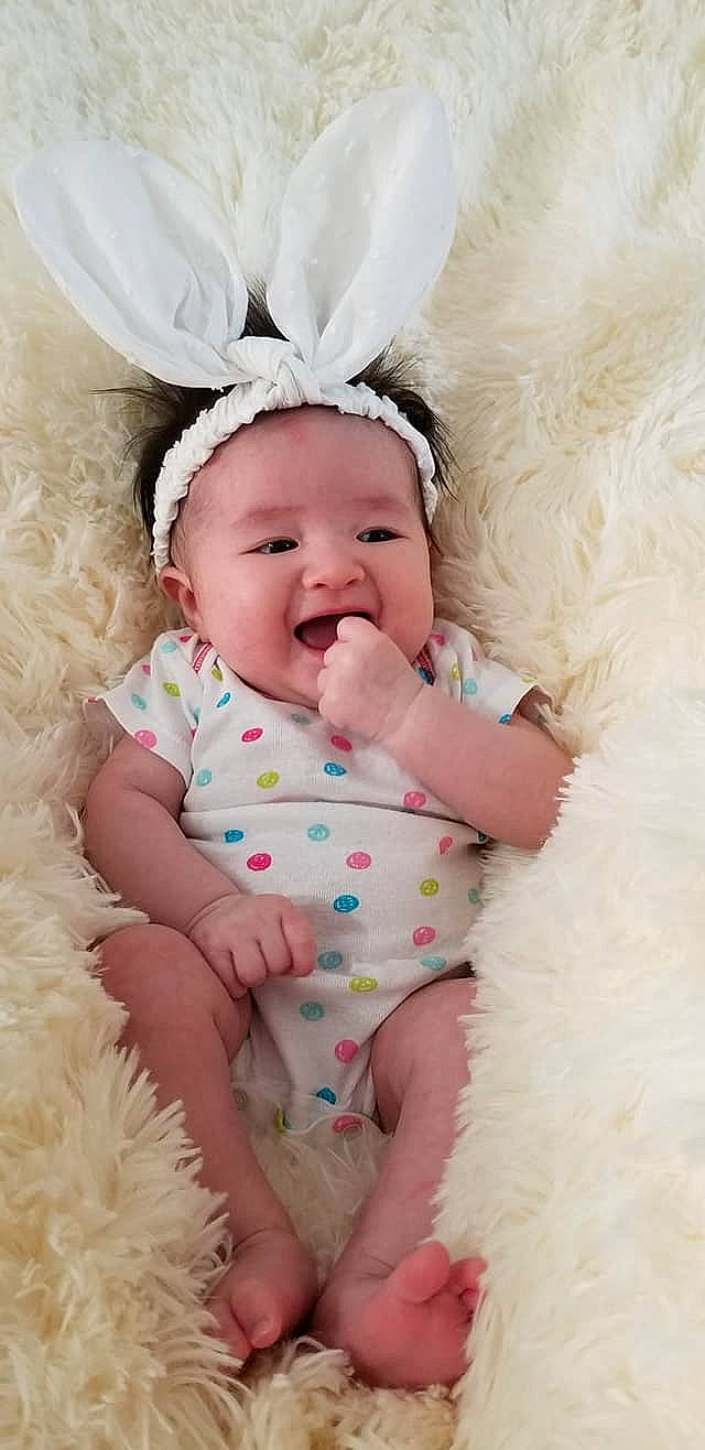 Mika is registered to the contest to win money with this photo: baby, baby_laughing, baby_products, baby_toddler_clothing, cheek, child, ear, fashion_accessory, fur, hair_accessory, happy, head, headgear, mouth, person, photography, pink, product, skin, smile