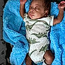 Kairo joined the competition — help win amazing prizes! baby, sleeping, blanket, blue, onesie, dinosaur_pattern, socks, infant, cute, resting, soft, cozy, child, bed, fabric, comfort, small_hands, peaceful, portrait, indoor
