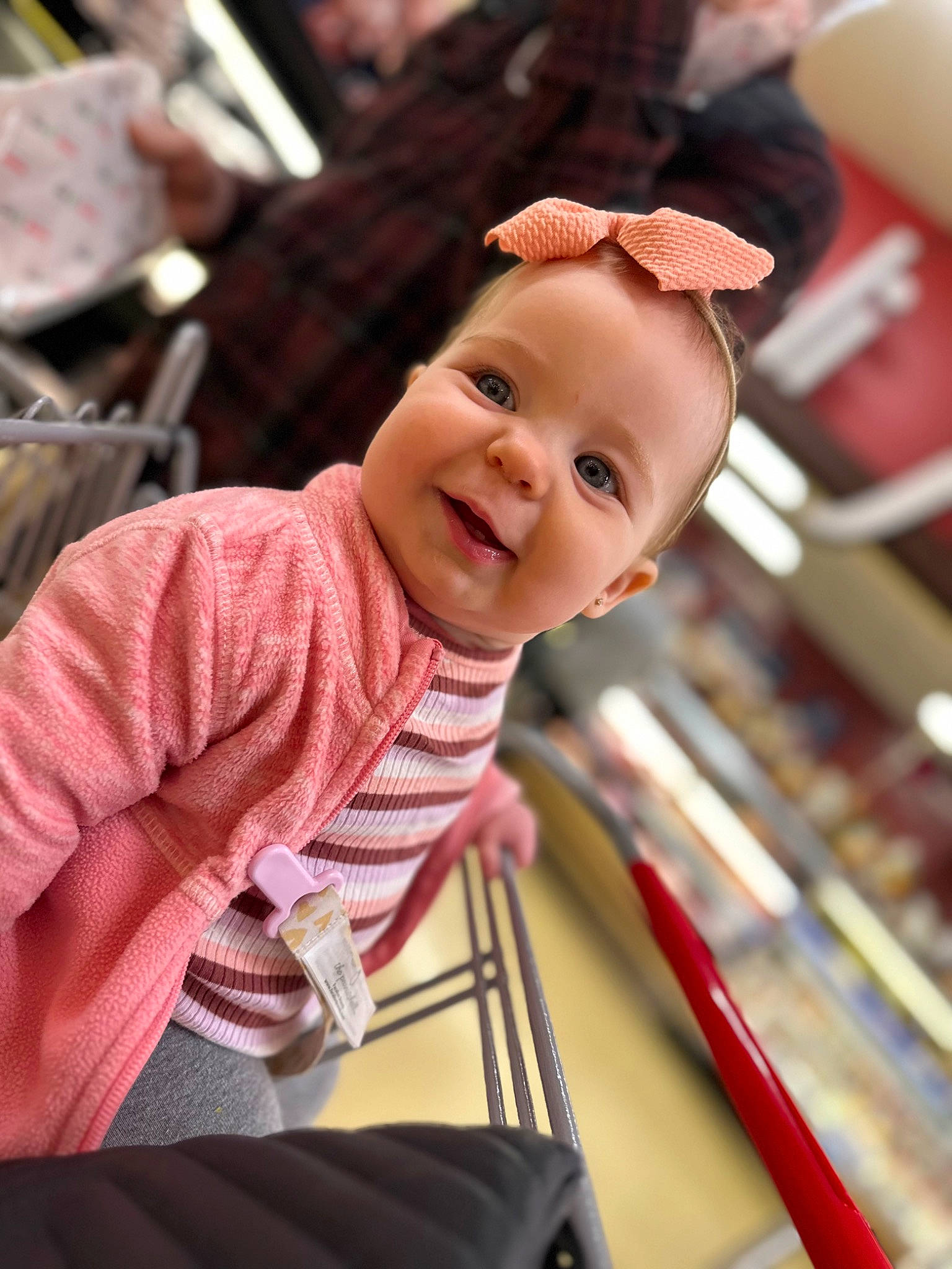 Ryleigh is registered to the contest to win money with this photo: amusement_ride, baby, baby_products, baby_toddler_clothing, cheek, child, event, fun, happy, hat, leisure, magenta, person, portrait_photography, recreation, sitting, skin, smile, toddler, travel