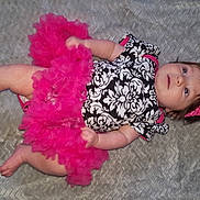 Saige is registered to the contest to win money with this photo: child, fun, girl, hair_accessory, infant, magenta, pink, product, skin, textile, toddler