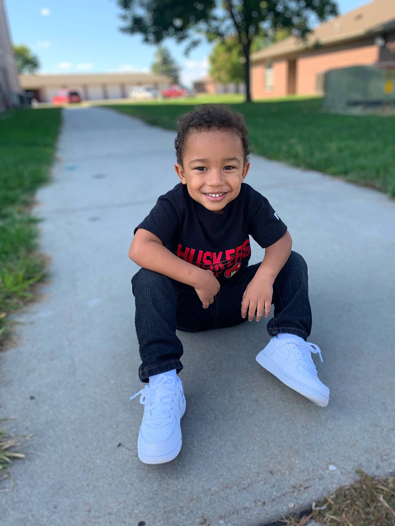 Zaidyn joined the competition — help win amazing prizes! baby, child, footwear, grass, happy, head, joy, leisure, male, person, photography, plant, play, recreation, shoe, sitting, skin, smile, t_shirt, toddler
