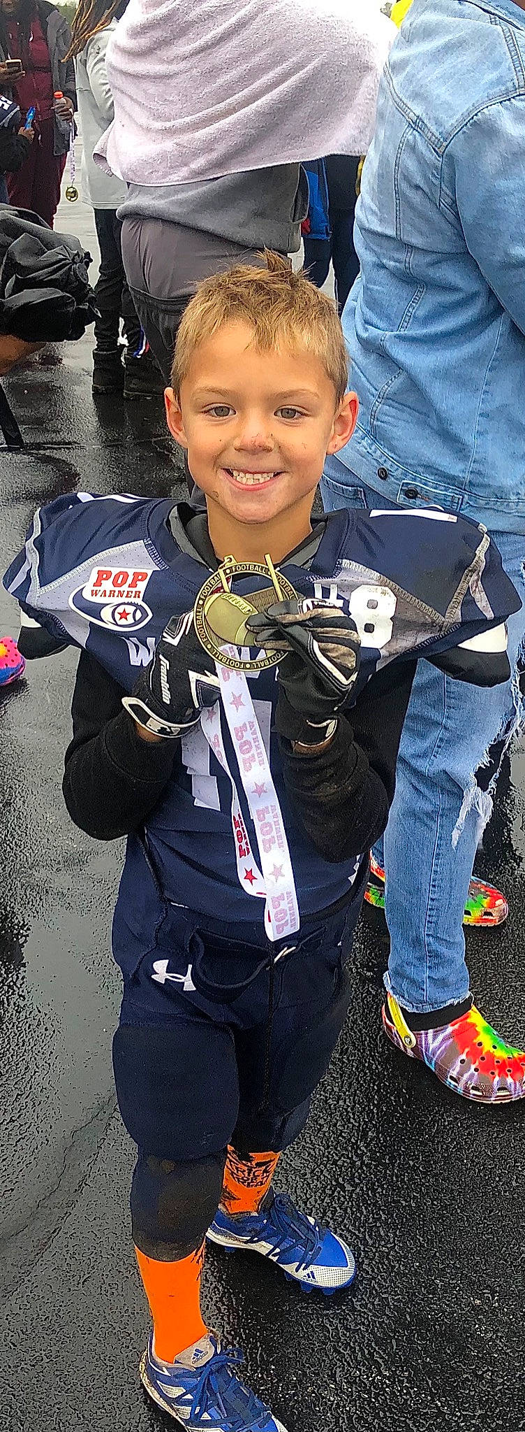 Isiah joined the competition — help win amazing prizes! child, clothing, competition_event, electric_blue, fun, glove, joy, motor_vehicle, outerwear, person, personal_protective_equipment, recreation, shoe, sleeve, smile, sneakers, sports_uniform, sportswear, t_shirt, toddler