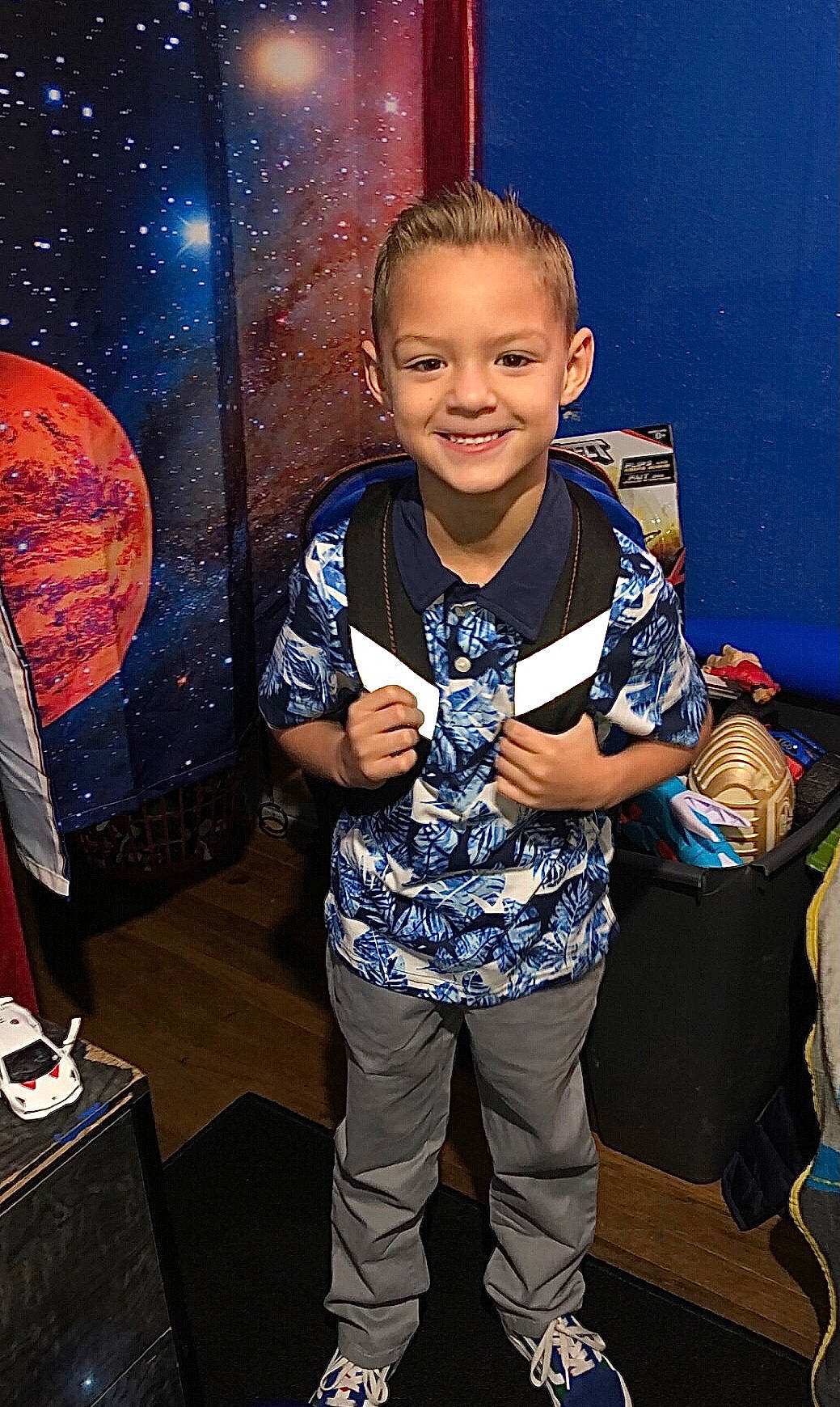 Isiah is registered to the contest to win money with this photo: child, cool, electric_blue, entertainment, event, flash_photography, football, fun, hairstyle, happy, human, joy, leisure, organ, pattern, person, smile, space, standing, t_shirt