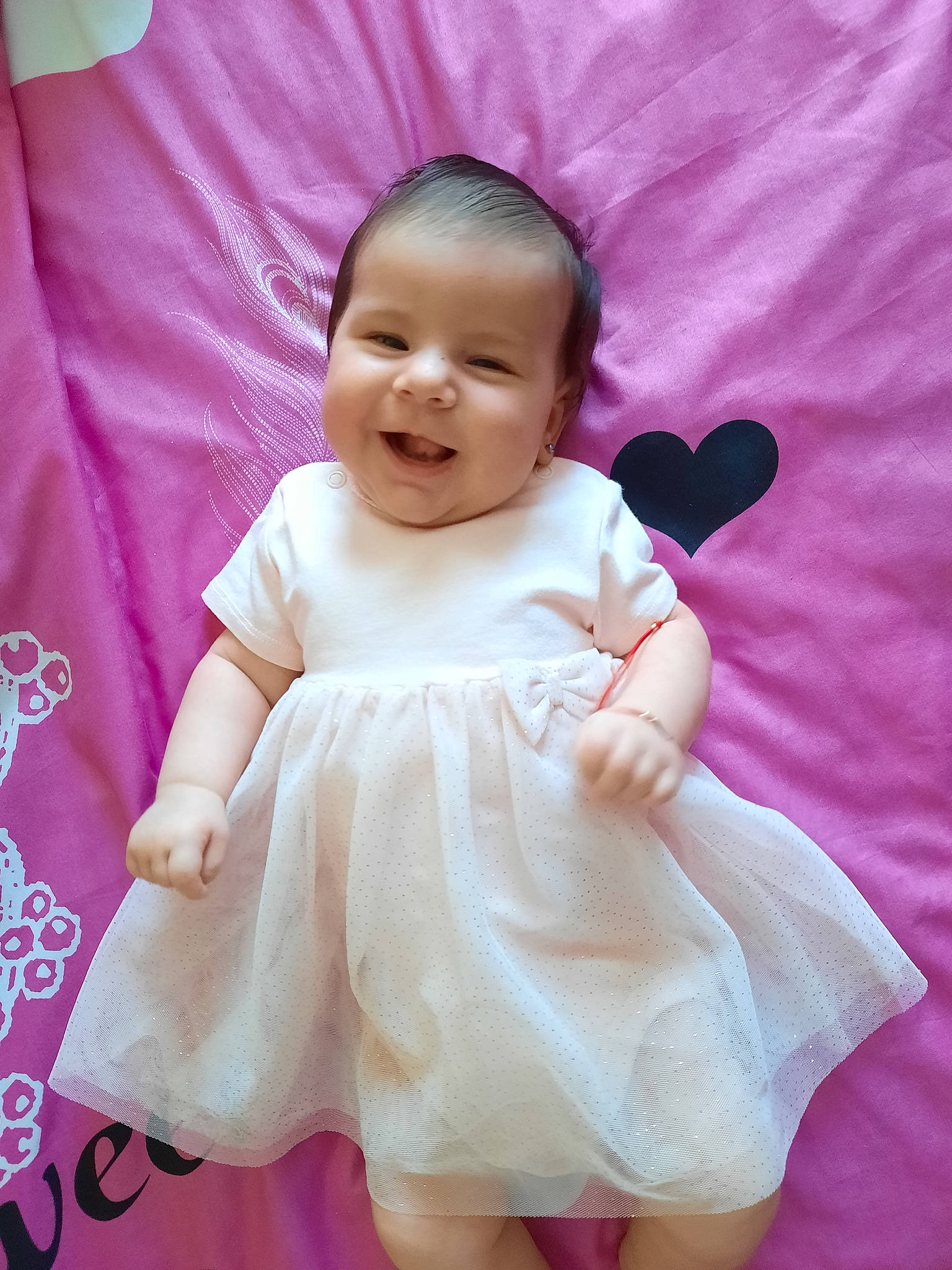 Izabela Maria participe au concours pour gagner de l'argent avec cette photo : baby, baby_toddler_clothing, cheek, child, day_dress, dress, formal_wear, happy, joy, linens, magenta, one_piece_garment, pattern, person, pink, purple, skin, sleeve, smile, textile