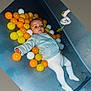 Kym participe au concours pour gagner de l'argent avec cette photo : baby, child, playpen, ball_pit, orange_balls, yellow_balls, white_balls, tights, long_sleeve, infant, indoor, soft_toys, toy, floor, cute, portrait, resting, baby_clothes, playtime, young_child