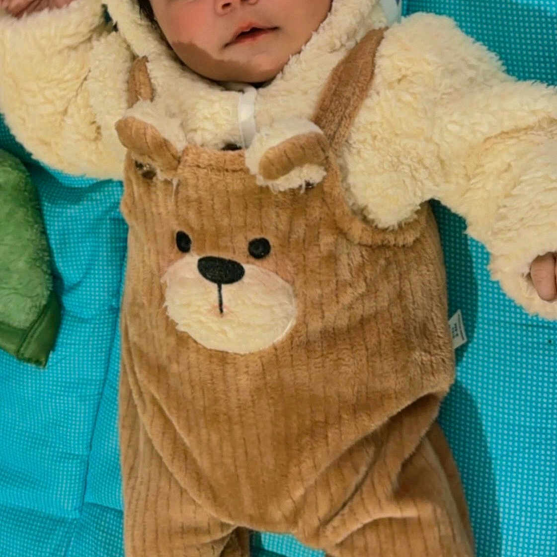 Triyansh joined the competition — help win amazing prizes! baby, bear_theme, blue_mat, child, clothing, cozy, cute, expression, face, indoors, infant, lying_down, onesie, pillow, plush, portrait, soft_texture, stars, warm_clothing, young_child