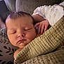 Addison joined the competition — help win amazing prizes! baby, newborn, sleeping, blanket, couch, pillow, face, hand, cozy, indoor, rest, comfort, child, soft, peaceful, infant, portrait, sleep, skin, furniture