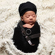 Tegraj joined the competition — help win amazing prizes! baby, beanie, blanket, bonnet, cap, clothing, face, hat, head, hood, hoodie, knitwear, newborn, person, photography, portrait, scarf, sleeping, sweater, sweatshirt