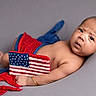 Tegraj joined the competition — help win amazing prizes! americanflag, baby, blanket, bodypart, clothing, face, finger, flag, frown, glove, hand, happy, head, hosiery, newborn, person, photography, portrait, smile, sock
