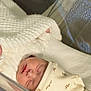 baby, newborn, sleeping, bassinet, blanket, swaddle, hat, infant, hand, face, peaceful, cozy, hospital, closeup, soft_light, white_texture, crib, tiny, portrait, newborn_bed