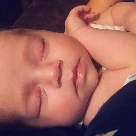 Zaidee joined the competition — help win amazing prizes! cheek, child, close_up, finger, girl, hand, lip, mouth, neck, sleep, thumb