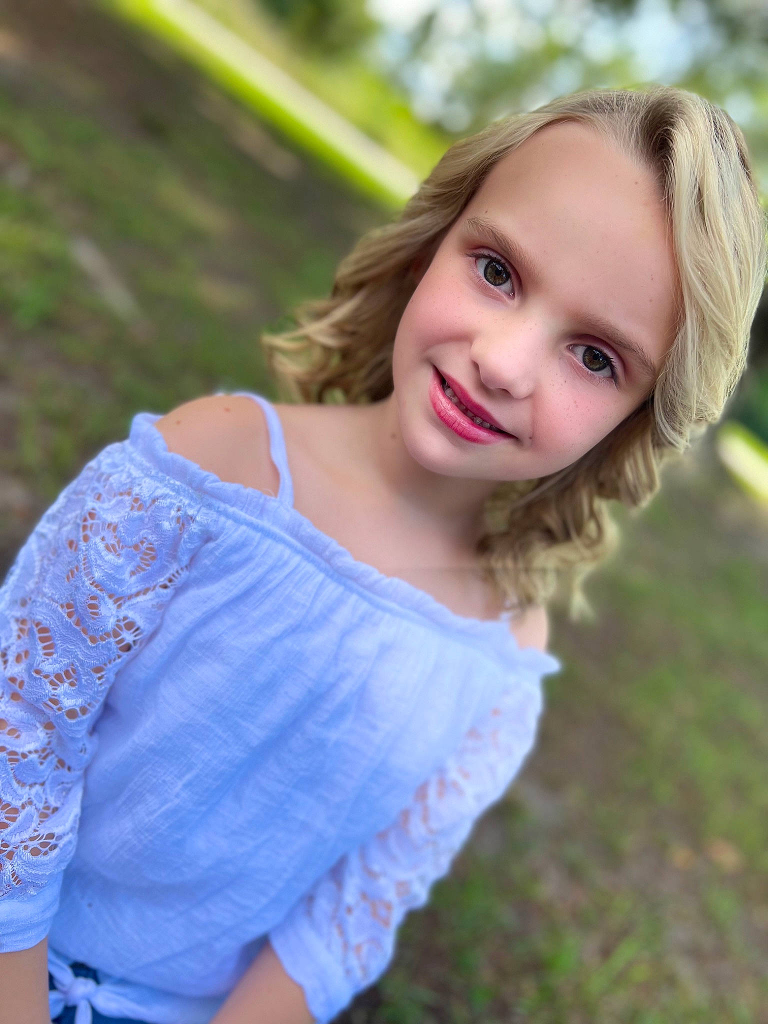 Adilynn is registered to the contest to win money with this photo: dress, eye, face, flash_photography, fun, grass, grassland, hair, happy, iris, joy, leisure, lip, long_hair, meadow, people_in_nature, person, plant, shoulder, skin