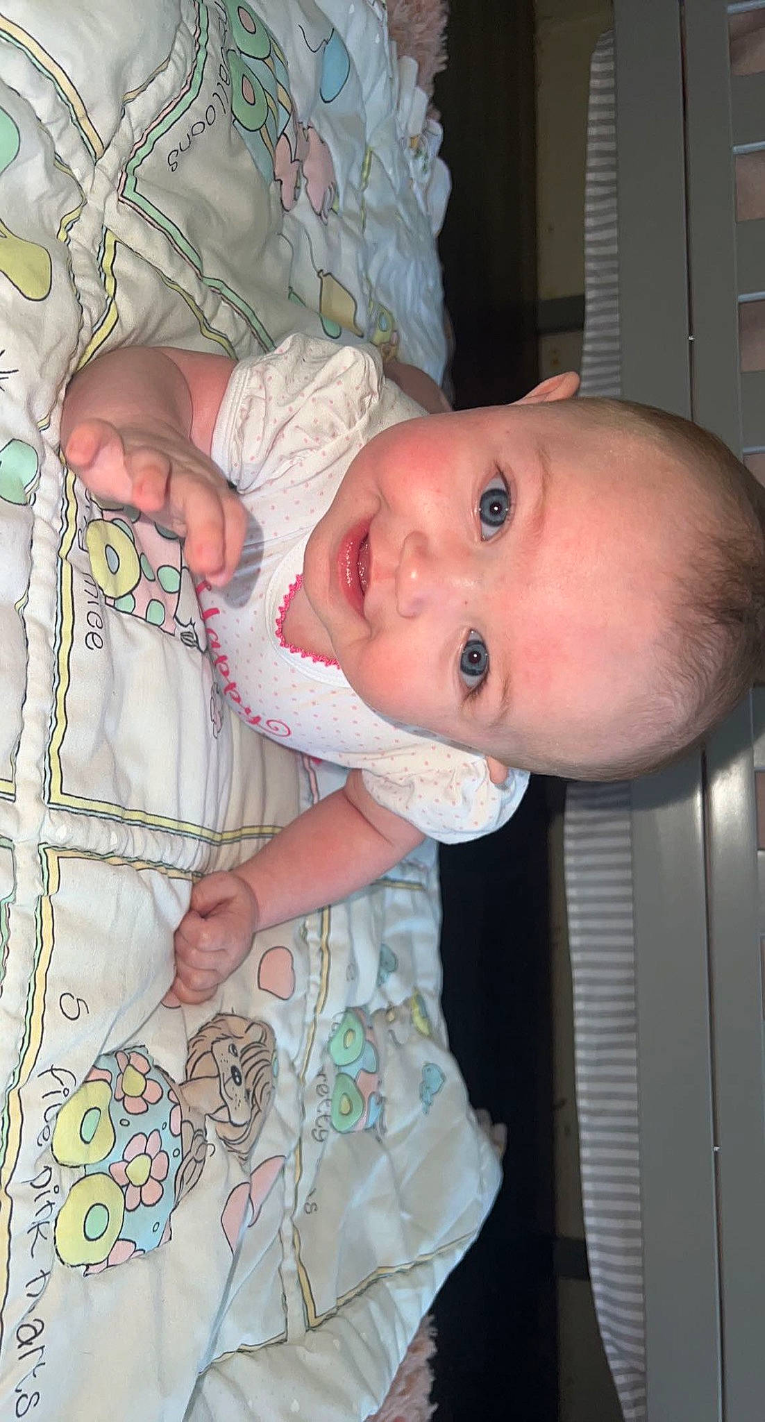 Paisley is registered to the contest to win money with this photo: arm, baby, baby_products, baby_toddler_clothing, cheek, child, eye, finger, hand, human_body, iris, lip, mammal, mouth, nose, pattern, person, skin, sleeve, toddler