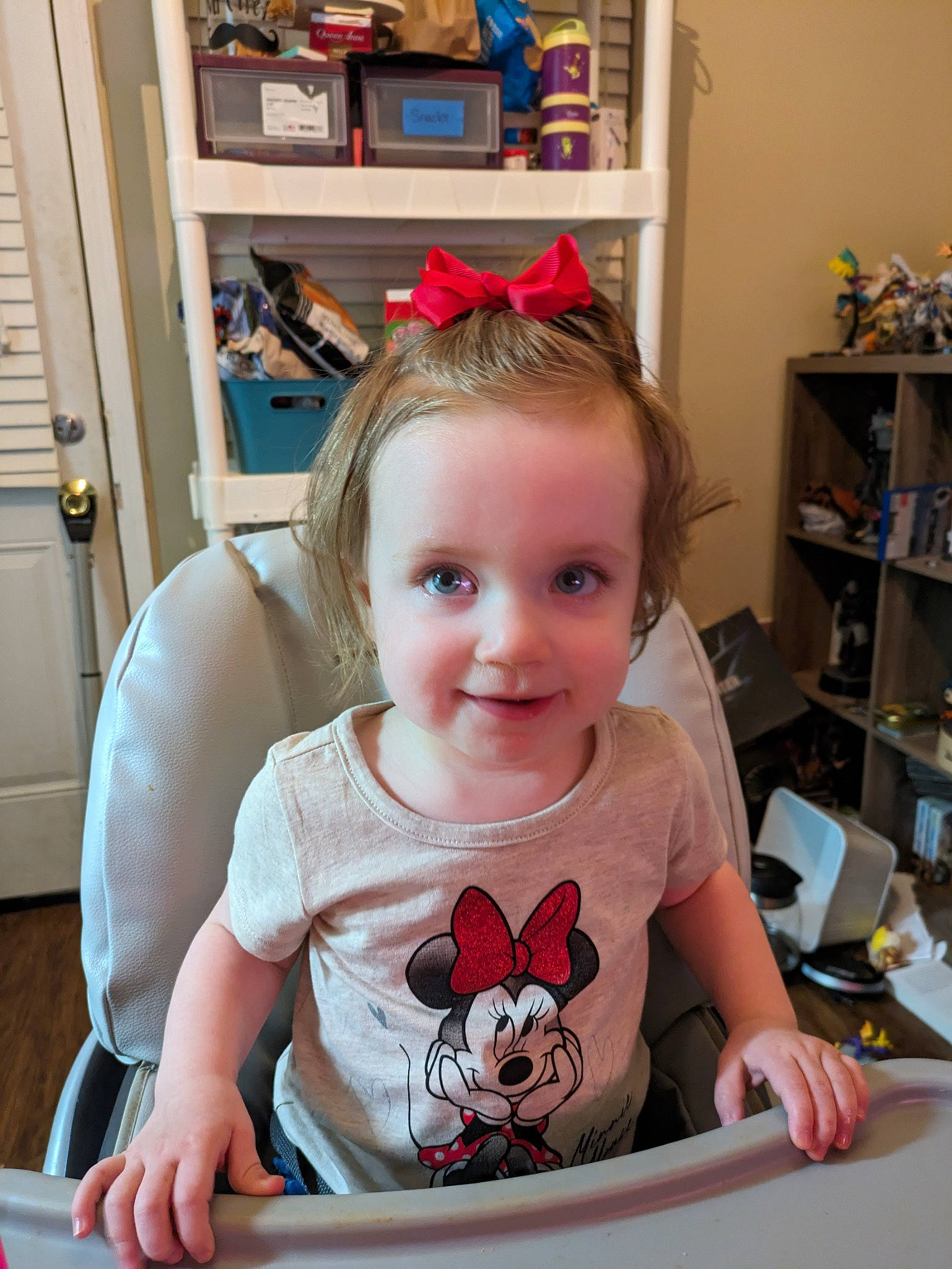 Everlee is registered to the contest to win money with this photo: baby, baby_toddler_clothing, cabinetry, chair, child, event, eyewear, fun, hair_accessory, happy, joy, person, picture_frame, pink, room, shelf, shelving, sitting, smile, sunglasses