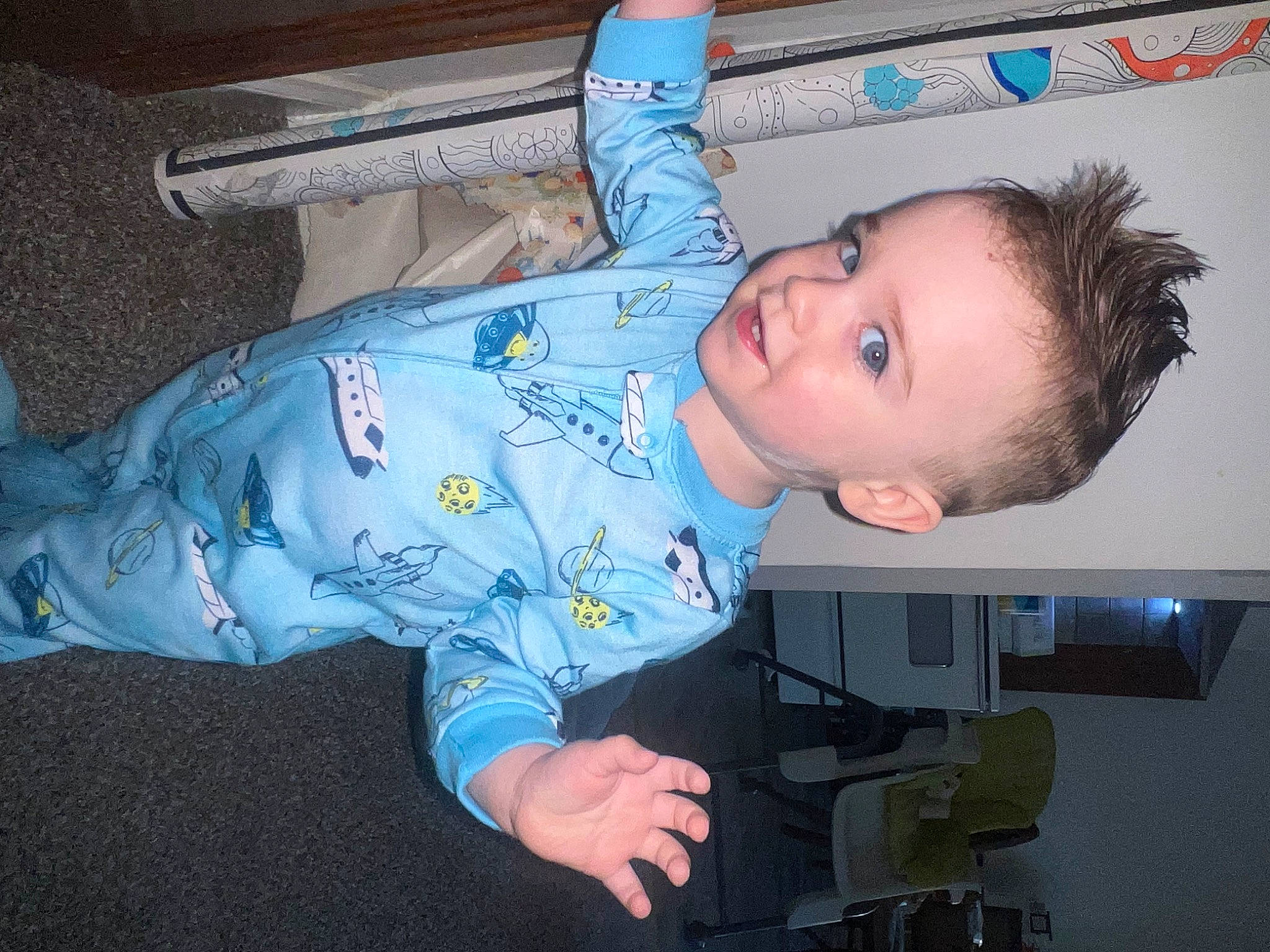 Levi is registered to the contest to win money with this photo: baby, baby_toddler_clothing, cheek, child, comfort, elbow, electric_blue, eye, finger, fun, hairstyle, hand, iris, mouth, nose, person, room, sitting, skin, smile