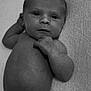 Frankie-Junior is registered to the contest to win money with this photo: baby, newborn, infant, diaper, black_and_white, lying_down, curious, face, hand, skin, portrait, closeup, expression, child, human, small, cute, texture, monochrome, soft