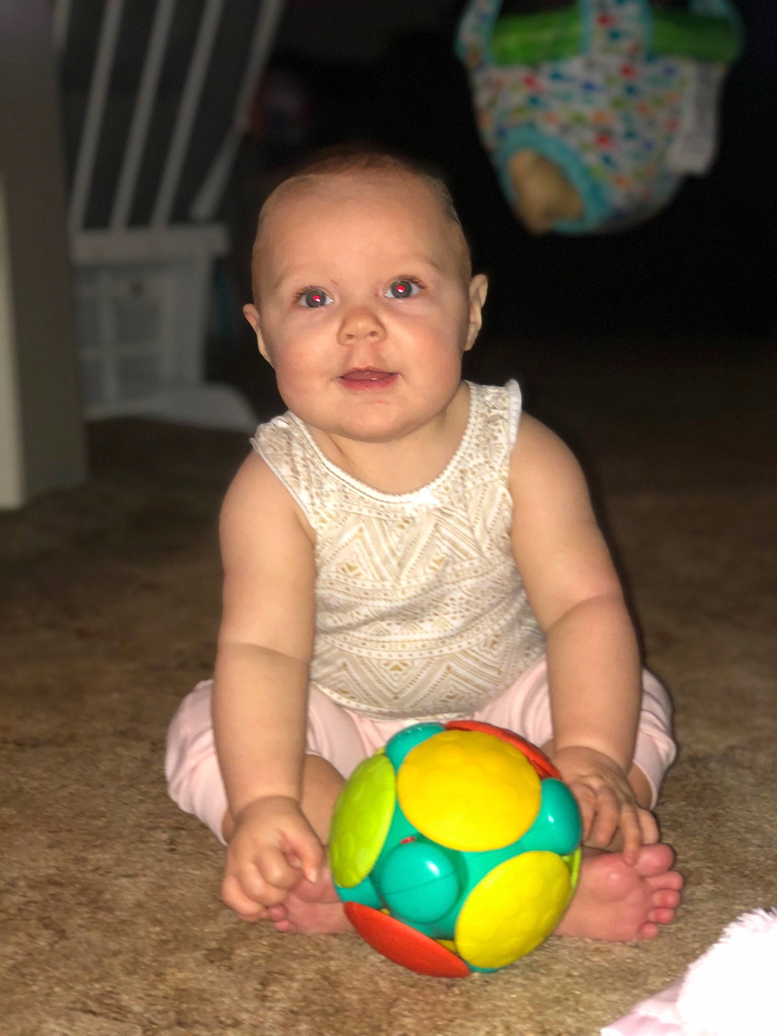 Mattie joined the competition — help win amazing prizes! baby, baby_playing_with_toys, baby_toddler_clothing, ball, cheek, eye, face, facial_expression, finger, flooring, football, fun, happy, head, person, product, smile, sports_equipment, sports_toy, toddler