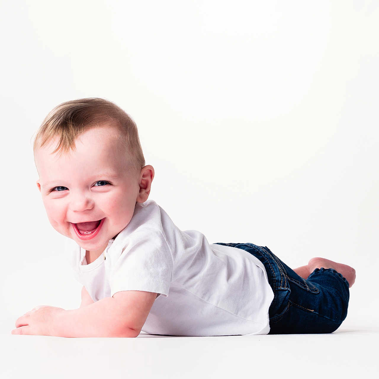 Kyan joined the competition — help win amazing prizes! baby, babylaughing, clothing, crawling, face, happy, head, laughing, pants, person, photography, portrait, smile