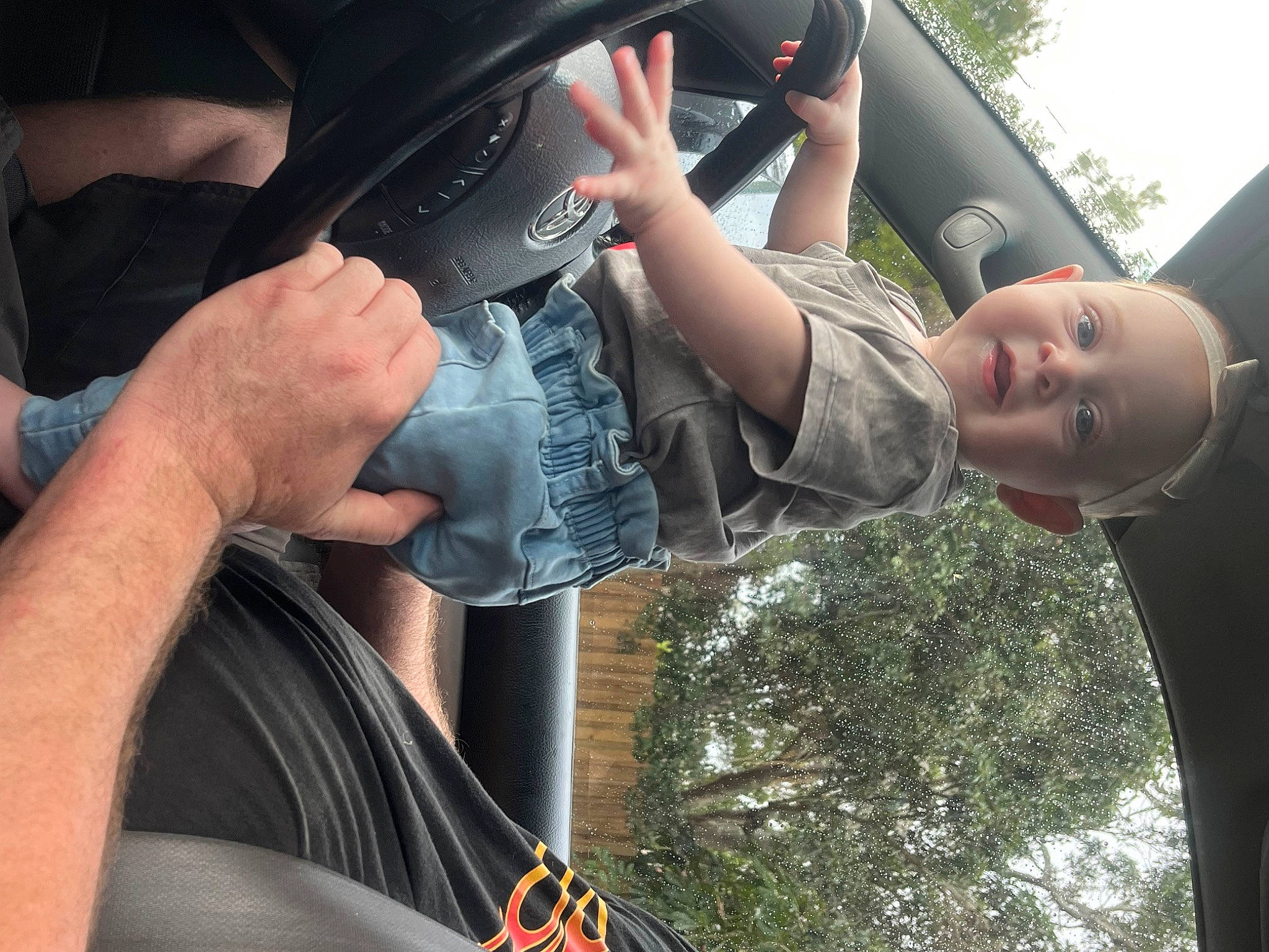 Amelia Kinsley joined the competition — help win amazing prizes! automotive_design, automotive_exterior, automotive_lighting, automotive_mirror, automotive_tire, automotive_wheel_system, bumper, car, fender, finger, gesture, grass, hand, happy, hood, human_body, motor_vehicle, person, tree, vehicle