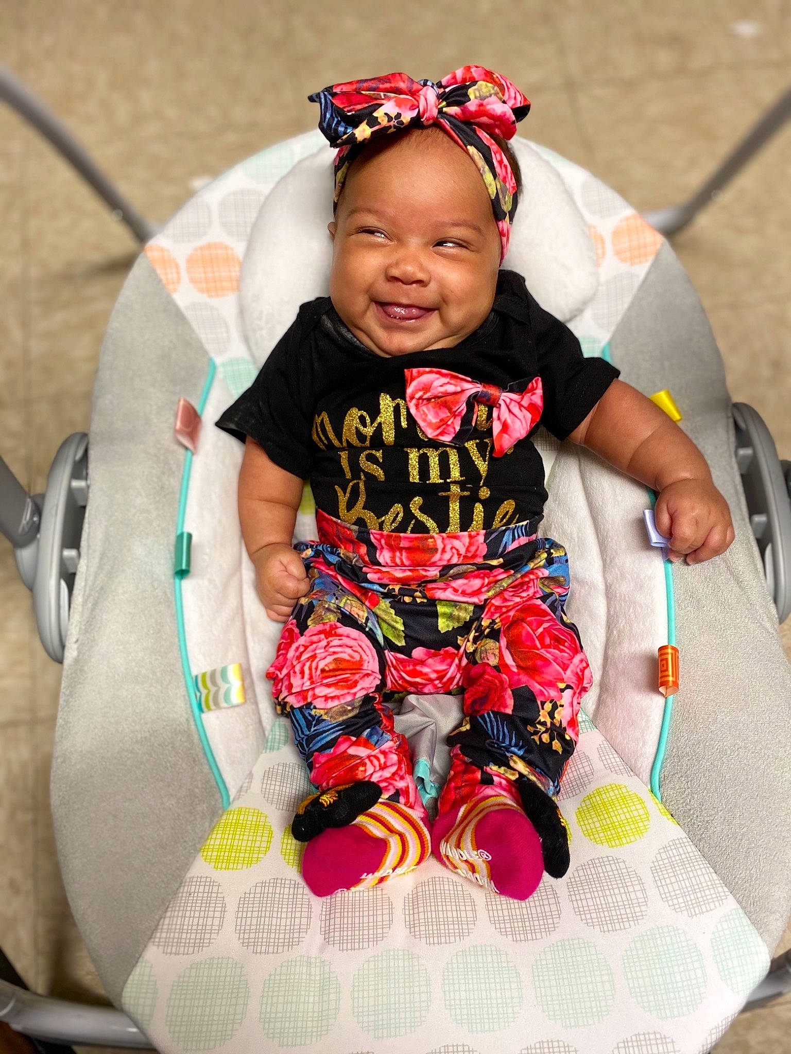 Tana joined the competition — help win amazing prizes! baby, baby_products, baby_toddler_clothing, cap, child, comfort, event, fashion_accessory, fun, grass, happy, headband, headwear, joy, mammal, pattern, person, pink, product, sitting