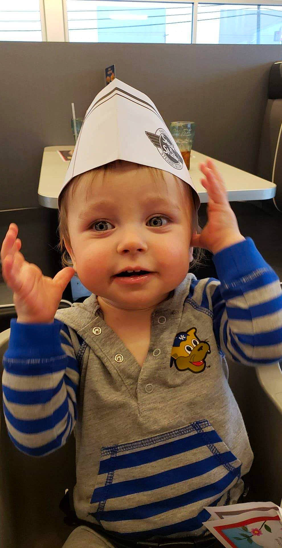 Elijah joined the competition — help win amazing prizes! baby, baseball_cap, cap, child, fun, hat, headgear, headwear, party_hat, person, smile, toddler