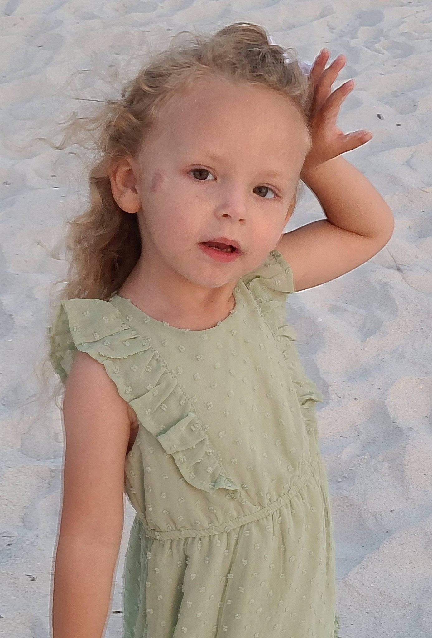 Brynlee is registered to the contest to win money with this photo: arm, baby_toddler_clothing, embellishment, eye, face, flash_photography, gesture, hair, happy, head, iris, joint, lip, neck, one_piece_garment, person, shoulder, skin, sleeve, standing