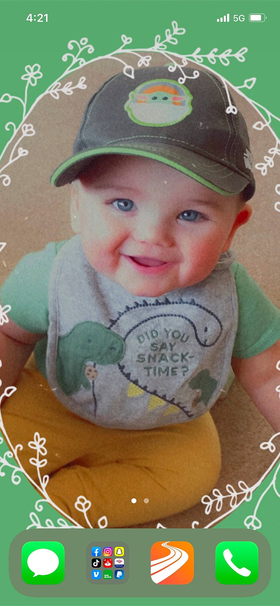 Damon is registered to the contest to win money with this photo: arm, baseball_cap, cap, cheek, clothing, cool, facial_expression, green, hairstyle, happy, headgear, headwear, organ, person, pink, product, skin, sleeve, smile, t_shirt