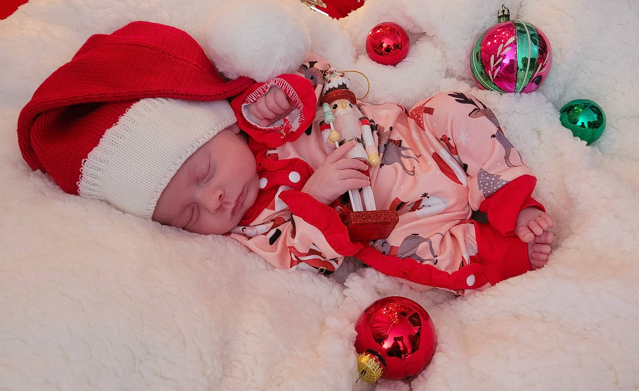 Alana joined the competition — help win amazing prizes! arm, baby, baby_sleeping, baby_toddler_clothing, child, comfort, event, face, hand, head, headwear, human_body, mammal, organ, person, pink, red, skin, sleeve, textile