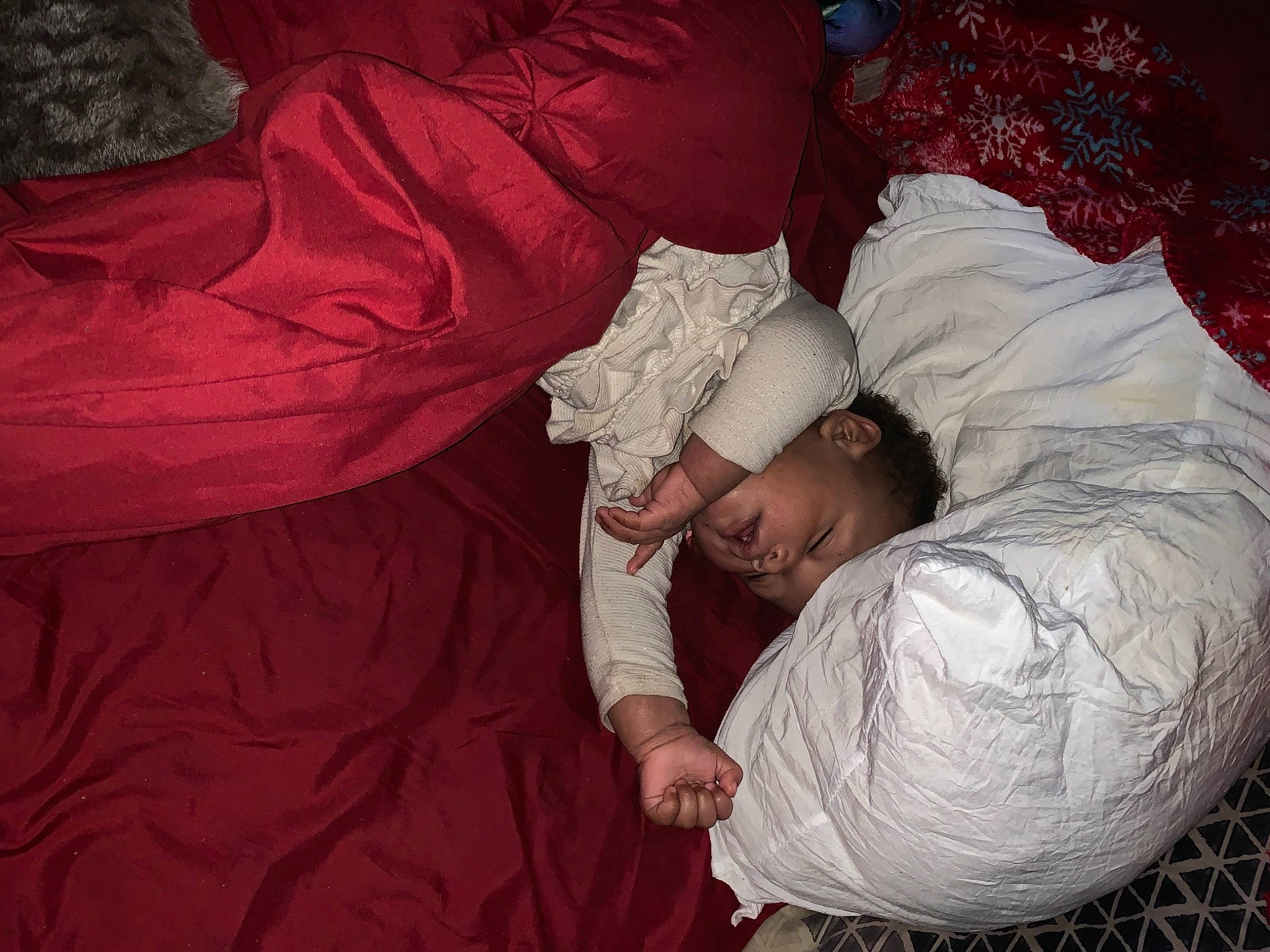 Lai Lani is registered to the contest to win money with this photo: baby, bed, bed_sheet, bedding, bedtime, carmine, child, comfort, darkness, flesh, gesture, linens, magenta, nap, pattern, person, pillow, room, sleeve, t_shirt