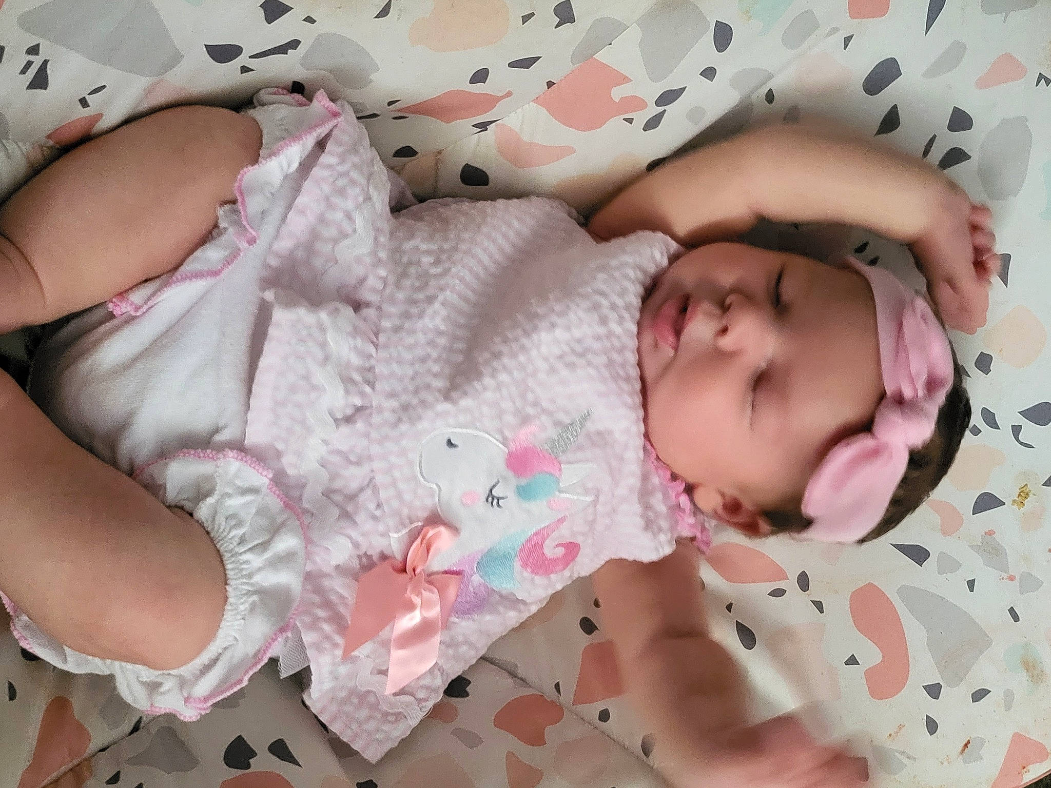 Lily-ann is registered to the contest to win money with this photo: baby, baby_products, baby_sleeping, baby_toddler_clothing, bedtime, cheek, child, comfort, headwear, linens, pattern, person, pink, skin, sleep, sleeve, toddler, white