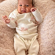 Kinsley joined the competition — help win amazing prizes! baby, infant, headband, bow, knitwear, socks, blanket, soft_texture, bokeh, portrait, smiling, cute, cozy, clothing, pink, cream, newborn, indoor, child, happy