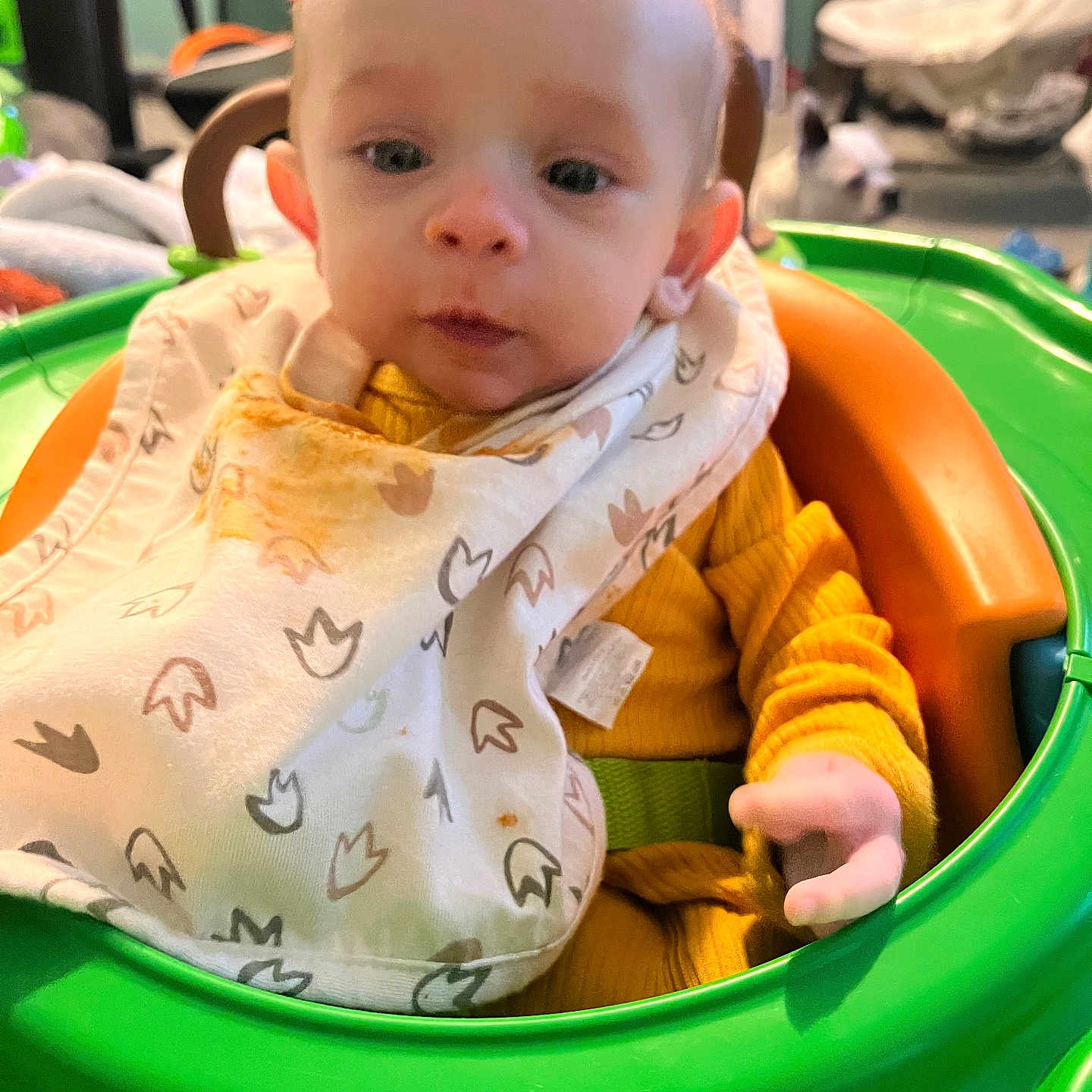 Arthur is registered to the contest to win money with this photo: baby, bib, bodypart, clothing, coat, cutlery, eating, face, finger, food, hand, happy, head, jacket, person, photography, portrait, sitting, smile, spoon