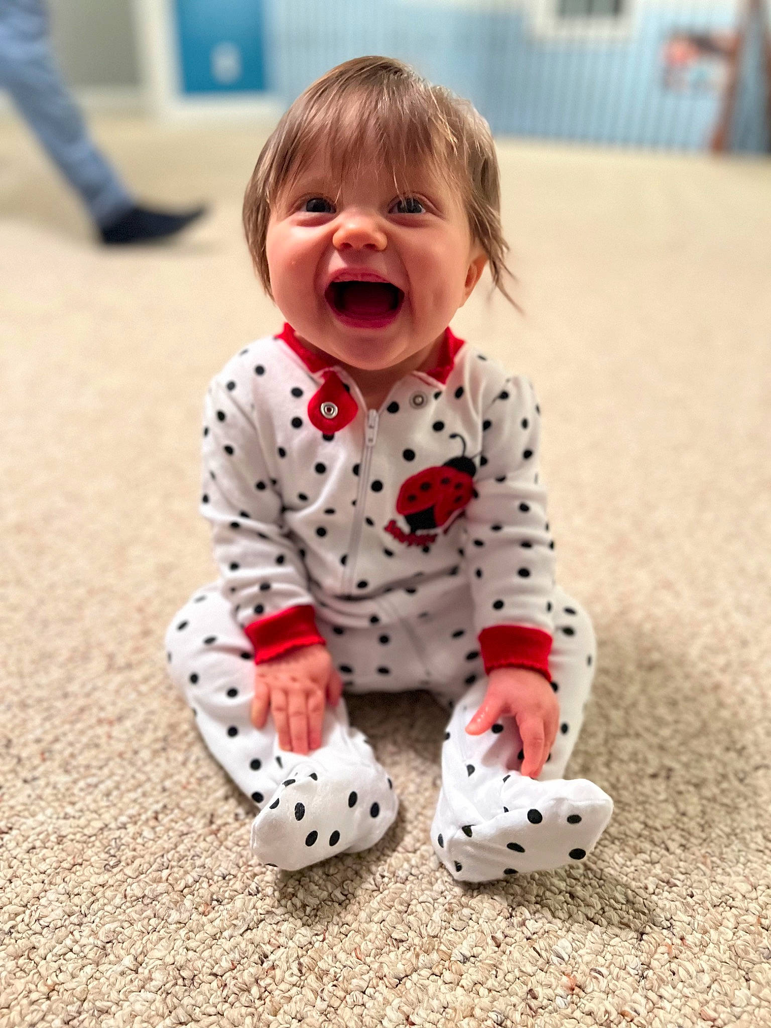 Adaleigh is registered to the contest to win money with this photo: baby, baby_toddler_clothing, child, flooring, foot, fun, grass, hair, happy, human_leg, knee, leg, pattern, person, play, recreation, sitting, sleeve, smile, toddler