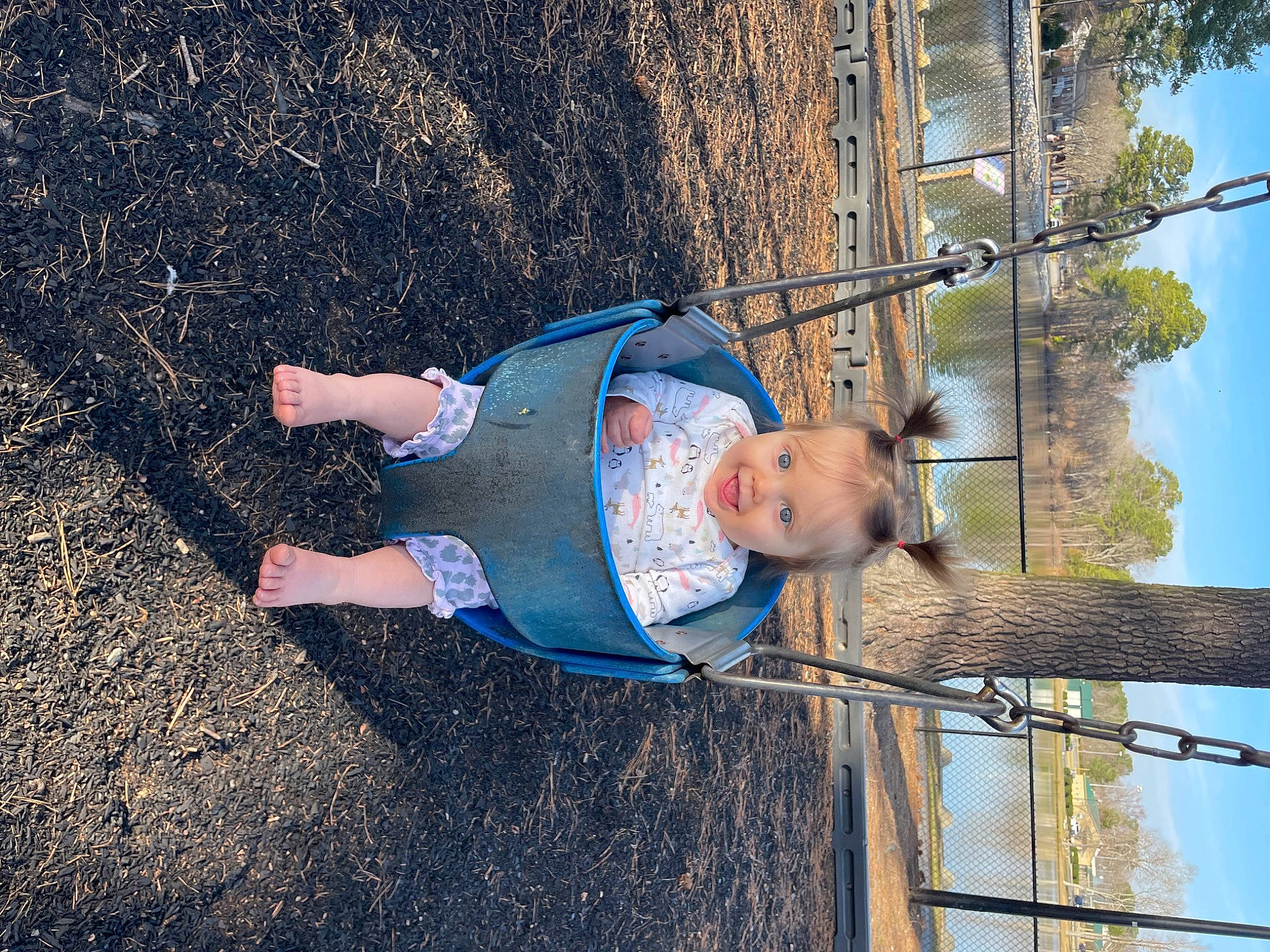 Adaleigh joined the competition — help win amazing prizes! baby, baby_toddler_clothing, child, city, electric_blue, fun, grass, happy, landscape, leisure, outdoor_play_equipment, people_in_nature, person, recreation, sky, soil, swing, toddler, tree, water