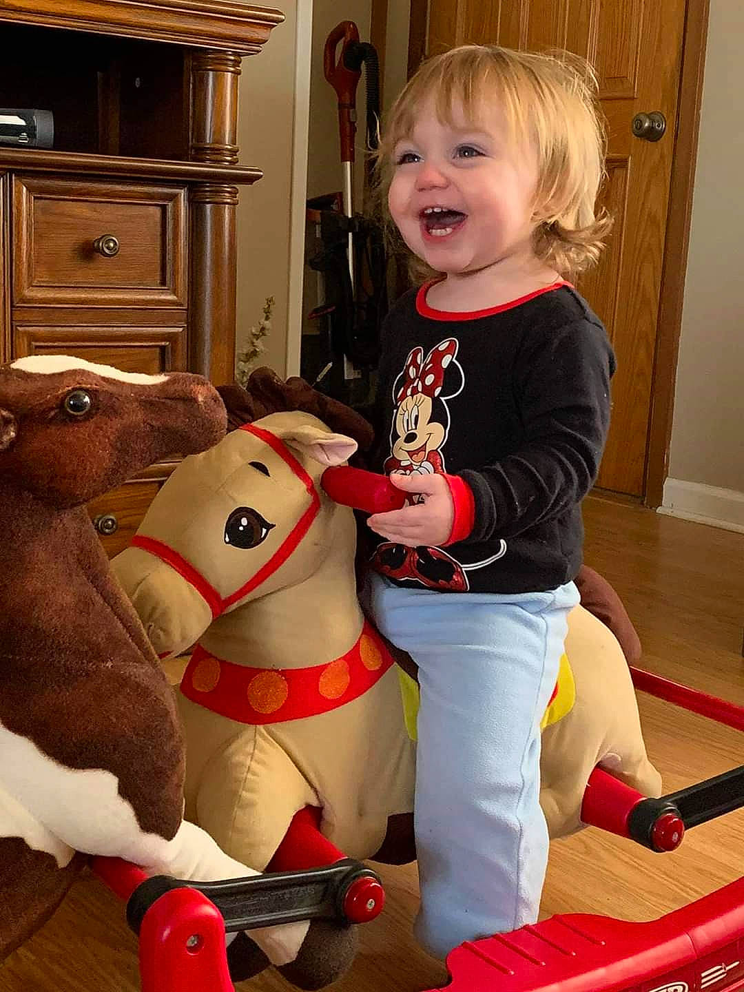 Ava is registered to the contest to win money with this photo: child, christmas, fawn, fun, leg, person, play, smile, toddler, toy