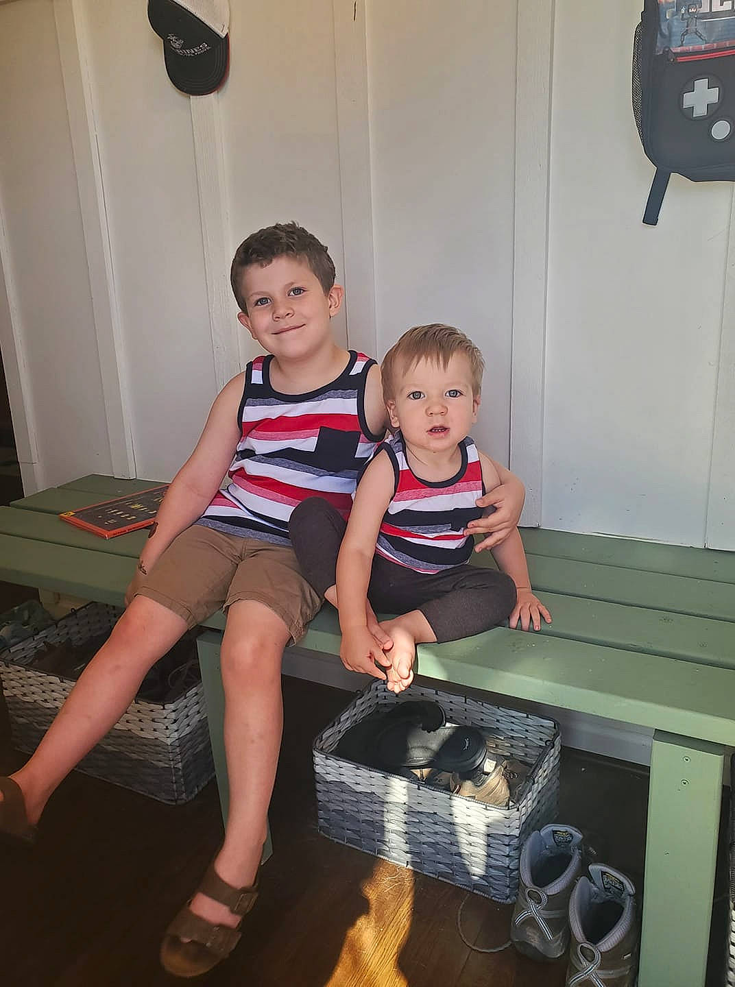 Alek is registered to the contest to win money with this photo: child, electronic_device, fun, joy, leg, person, room, technology, toddler, vacation