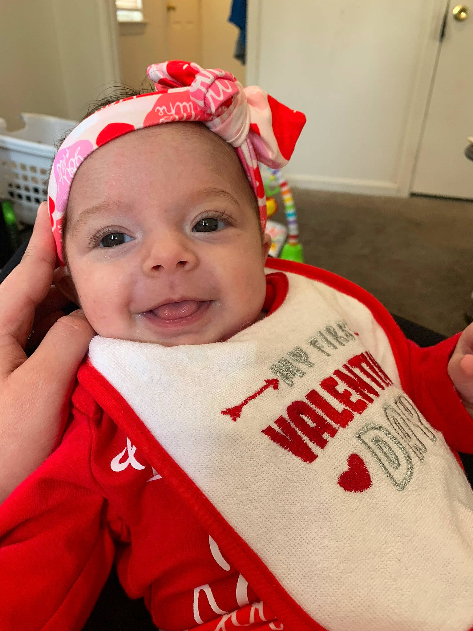 Miley is registered to the contest to win money with this photo: baby, baby_toddler_clothing, cap, cheek, child, christmas_eve, cool, costume_hat, door, event, eye, eyebrow, happy, headwear, holiday, jersey, lip, person, sleeve, smile